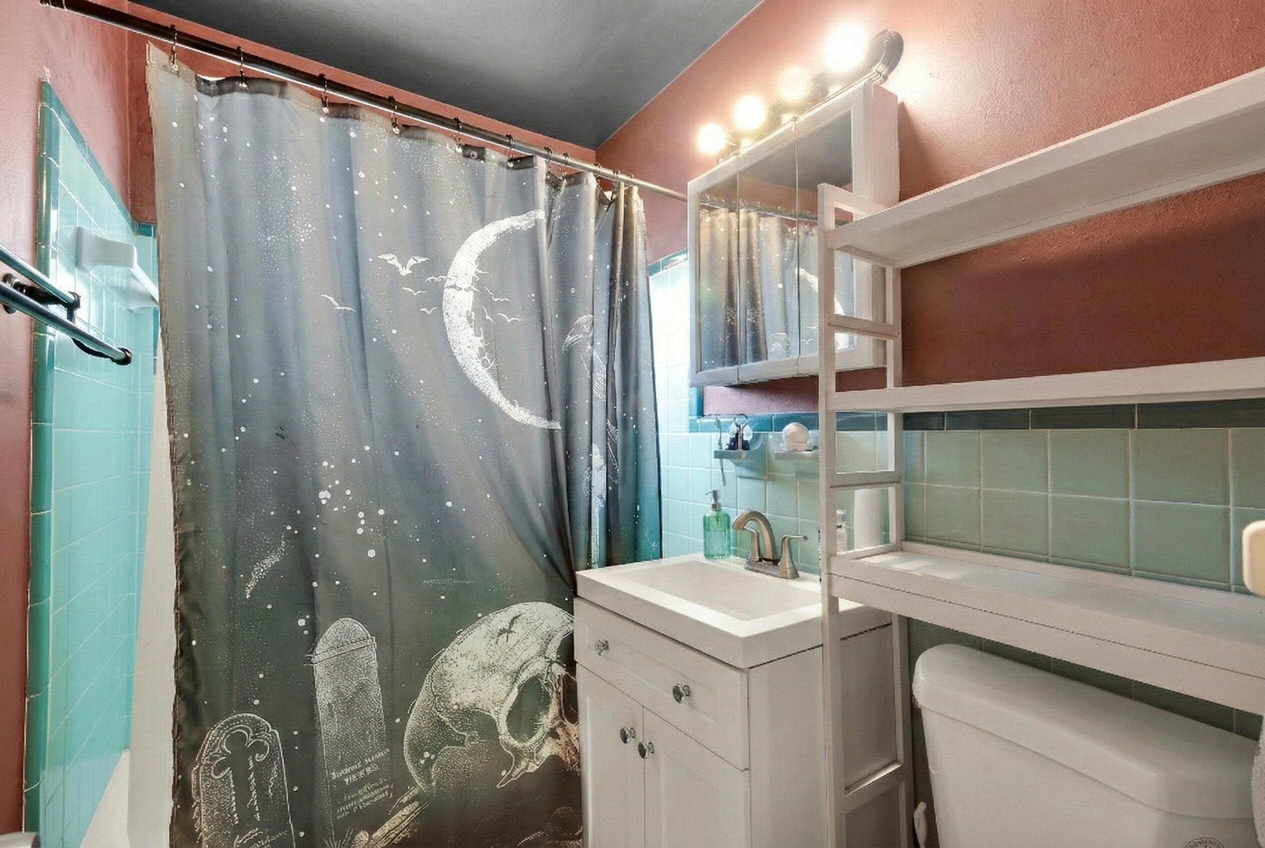 1614 Dennis Street Key West, FL 33040 - Photo 5 of 59 a bathroom with a sink mirror and shower