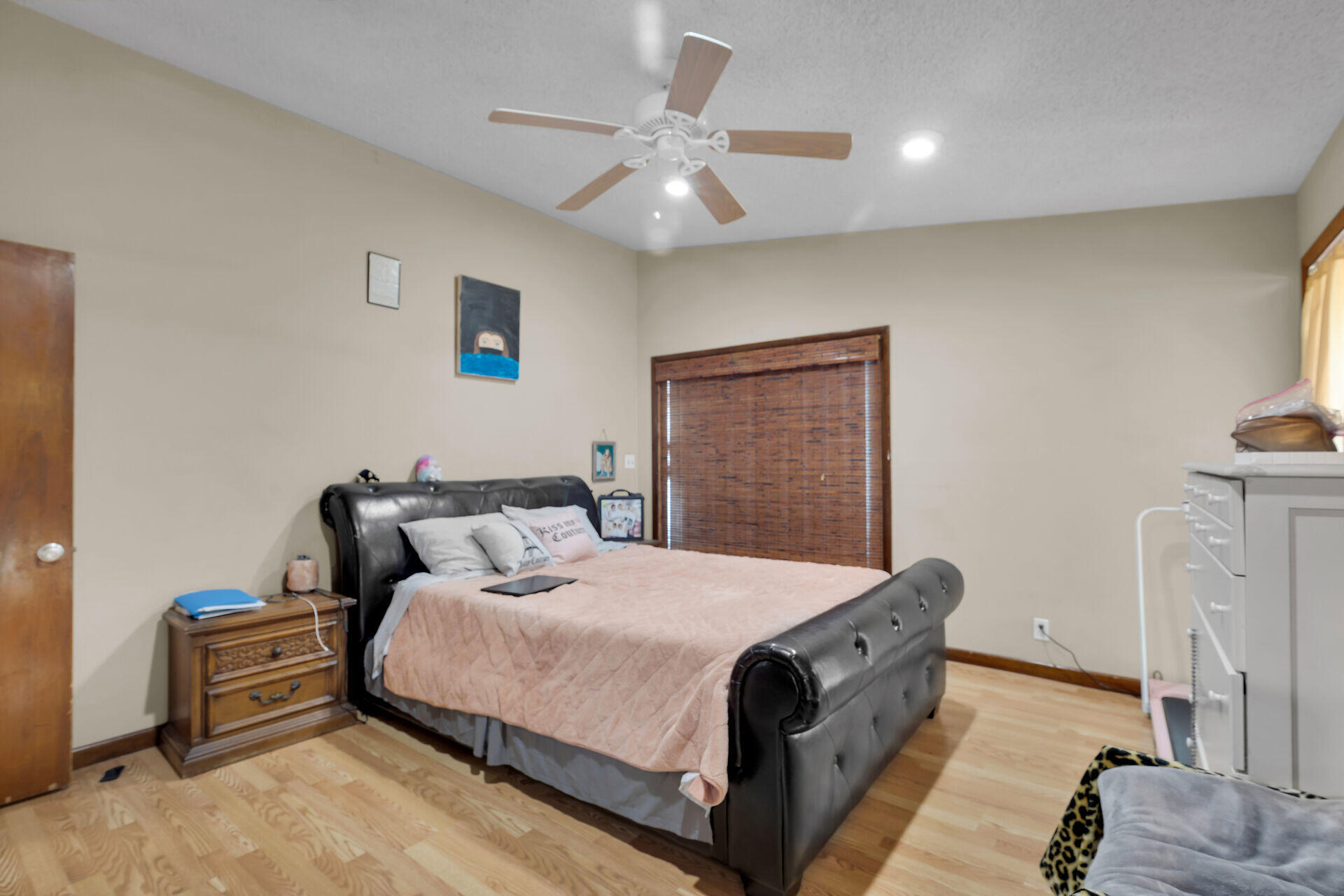 1614 Dennis Street Key West, FL 33040 - Photo 51 of 59 a bed room with a bed and a chandelier