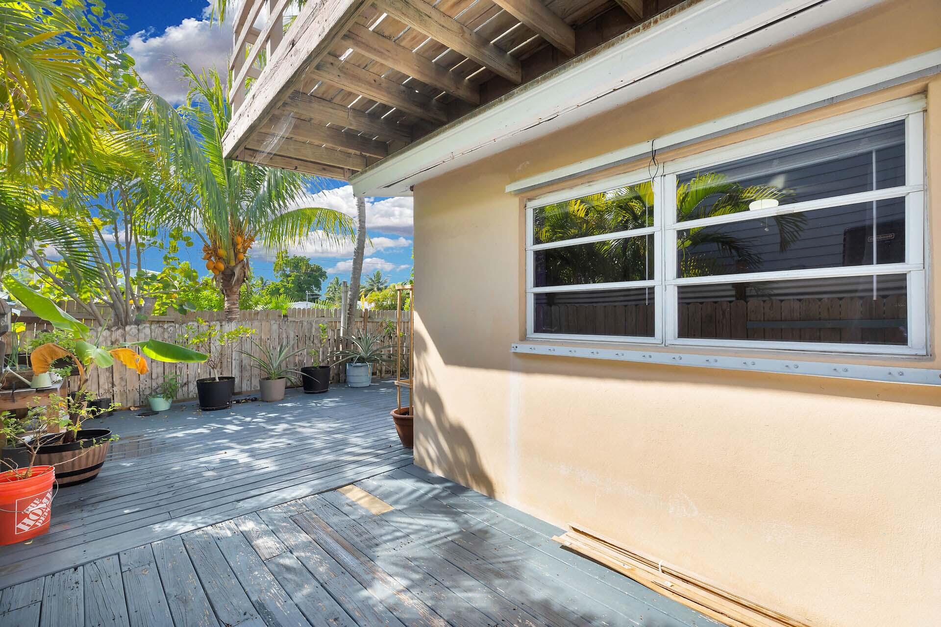 1614 Dennis Street Key West, FL 33040 - Photo 9 of 59 a house with swimming pool in front of it