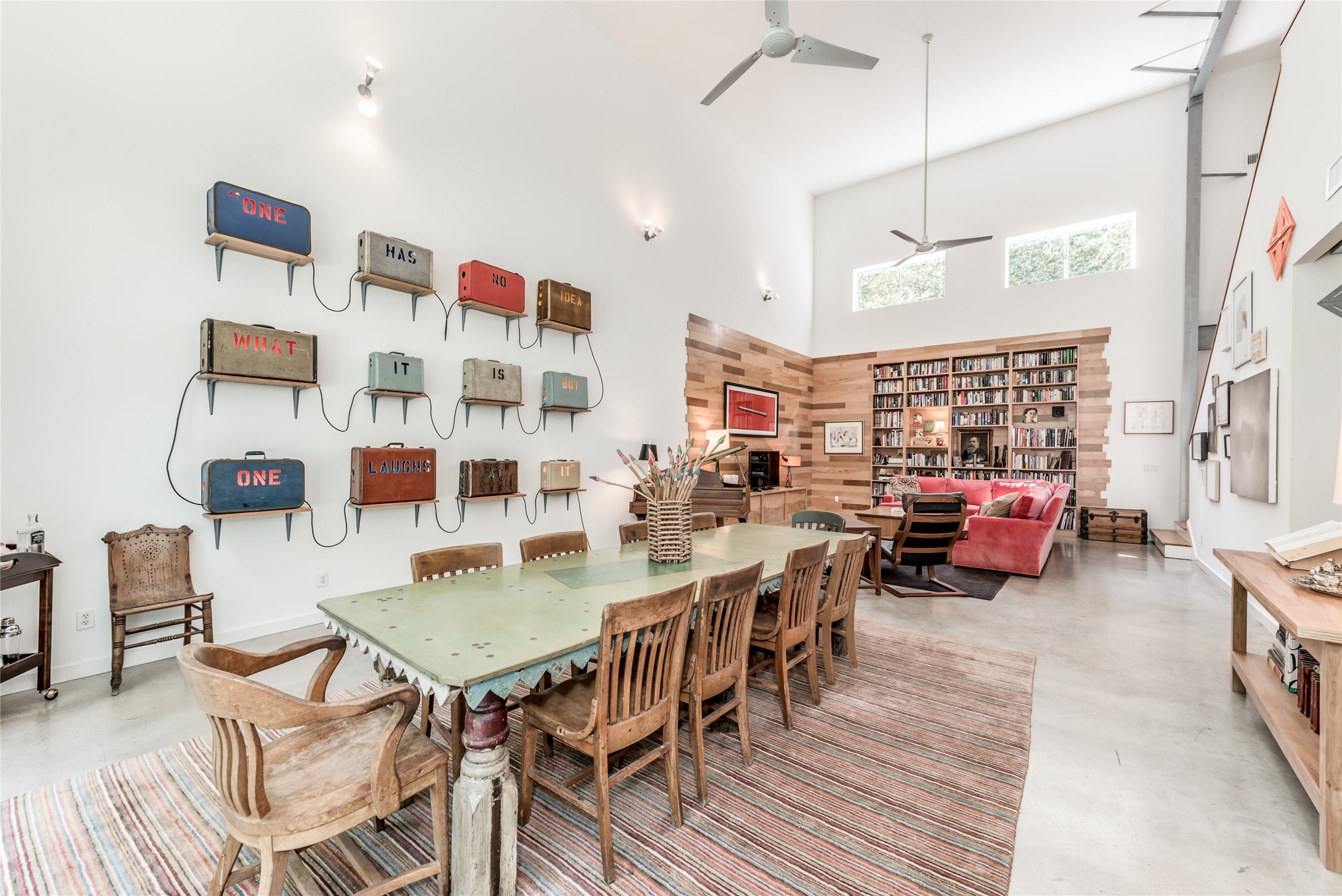 5755 Knox Street Houston, TX 77091 - Photo 15 of 44 a view of a dining room with furniture and a chandelier