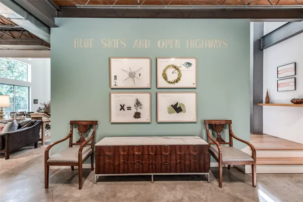 a kitchen with stainless steel appliances granite countertop a stove and a refrigerator