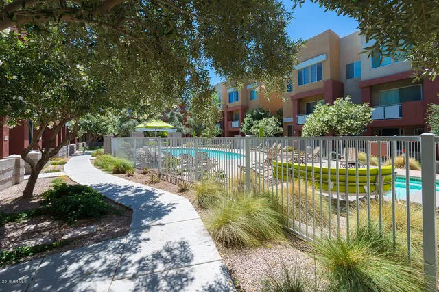 a view of swimming pool with a patio