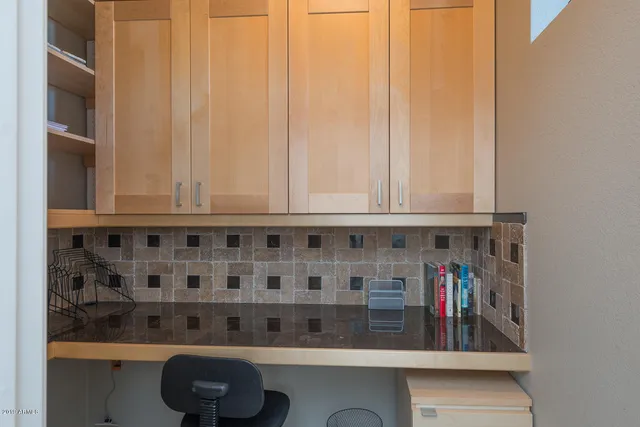 a close view of a sink and a cabinet