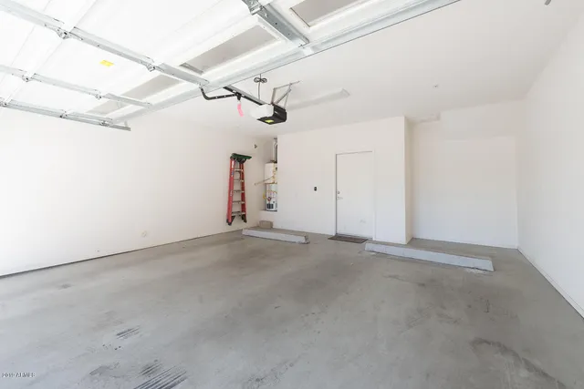 a view of a swimming pool with a lounge chairs