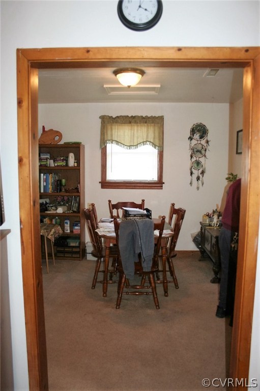 2410 Sandy Hook Road Goochland, VA 23063 - Photo 7 of 17 a view of a dining room with furniture and a window