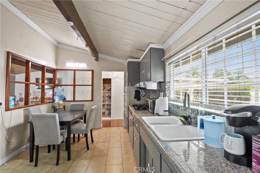 14049 Foster Road La Mirada, CA 90638 - Photo 5 of 16 a dining room with furniture and large windows
