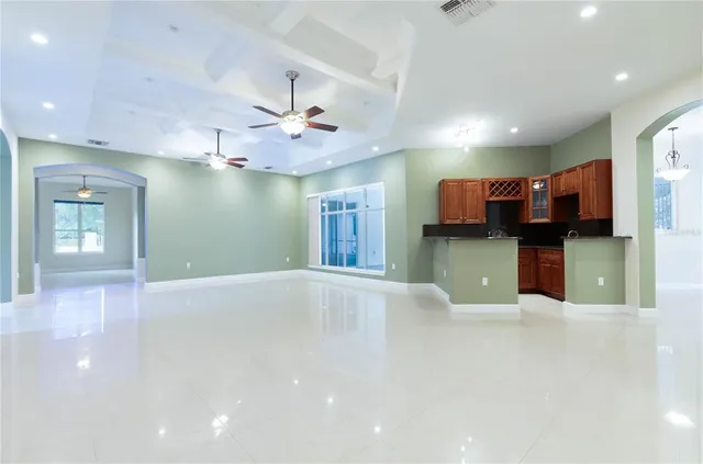 a kitchen with a sink stove and refrigerator