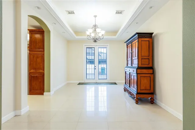 a kitchen with stainless steel appliances granite countertop a sink a oven and a counter space