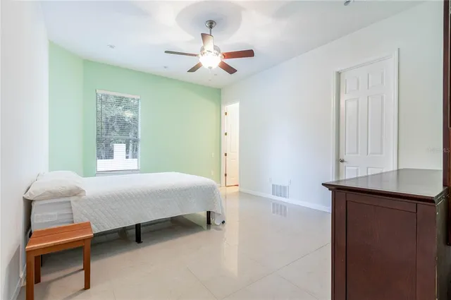 a bathroom with a sink a mirror and a toilet