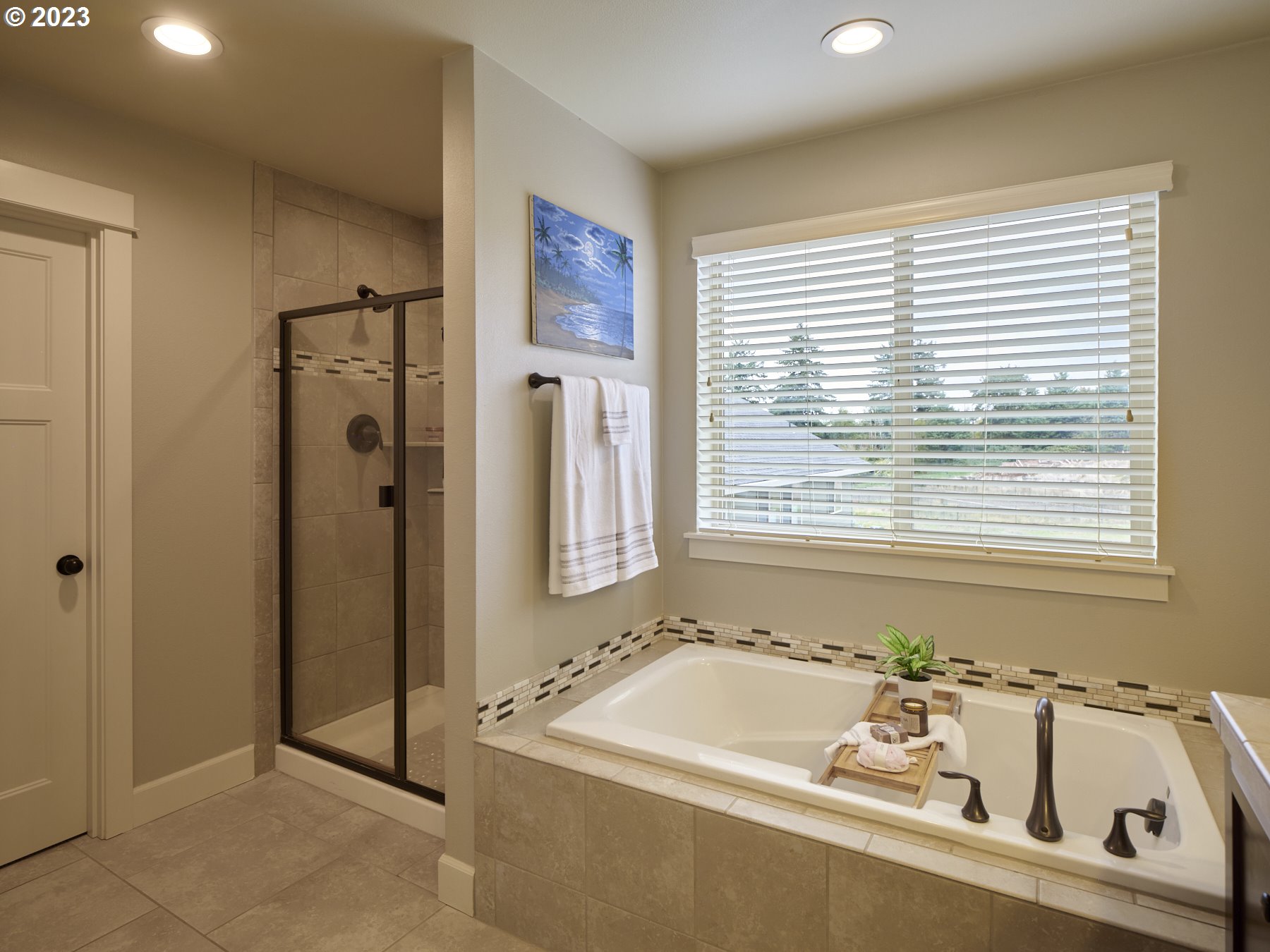 1424 Northwest Goodwin Street Camas, WA 98607 - Photo 23 of 40 a bathroom with a bathtub and a sink