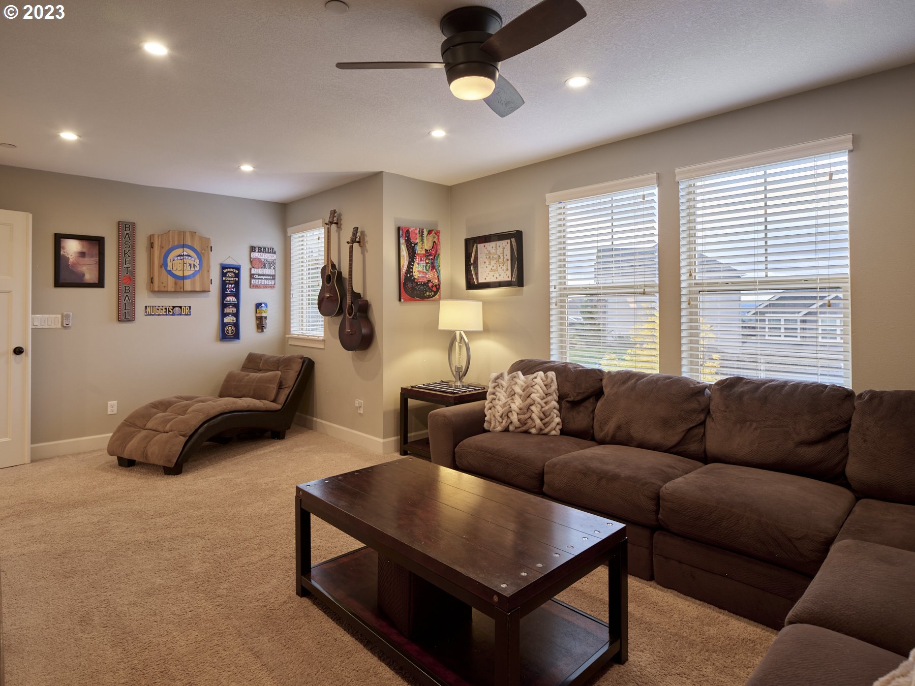 1424 Northwest Goodwin Street Camas, WA 98607 - Photo 26 of 40 a living room with furniture ceiling fan and a window