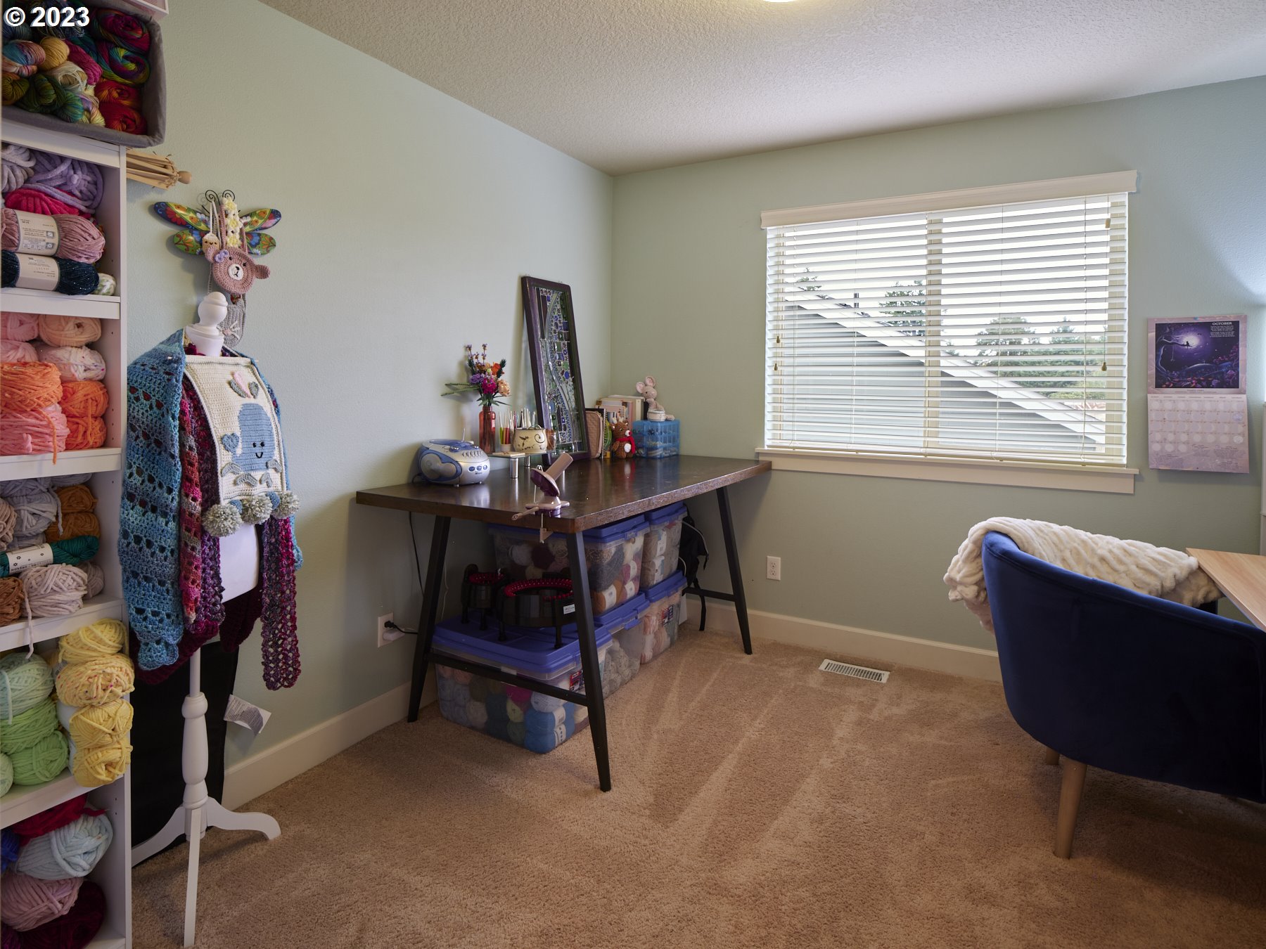 1424 Northwest Goodwin Street Camas, WA 98607 - Photo 31 of 40 a view of a workspace with furniture and a window