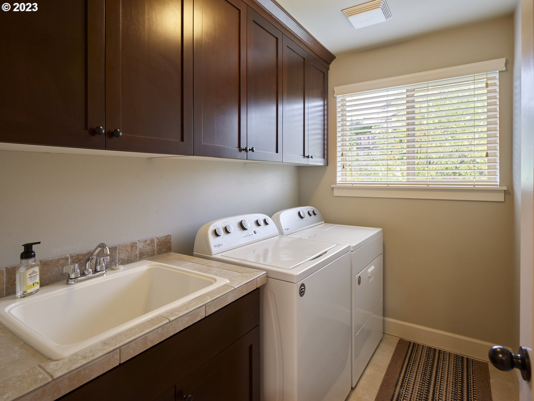 1424 Northwest Goodwin Street Camas, WA 98607 - Photo 32 of 40 a utility room with dryer and washer