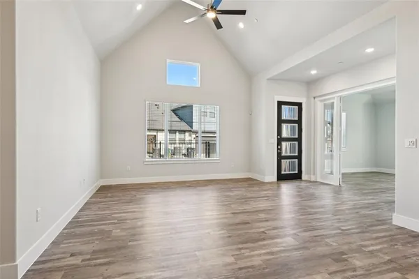 a kitchen with a sink and a refrigerator