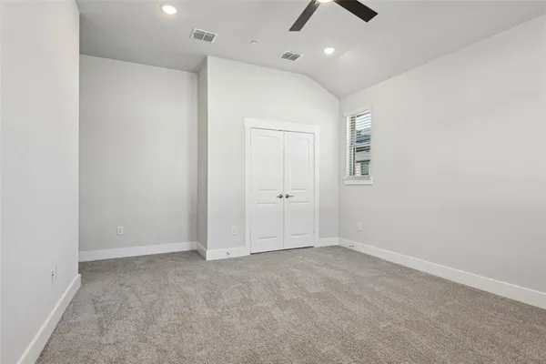 a bathroom with a double vanity sink and mirror