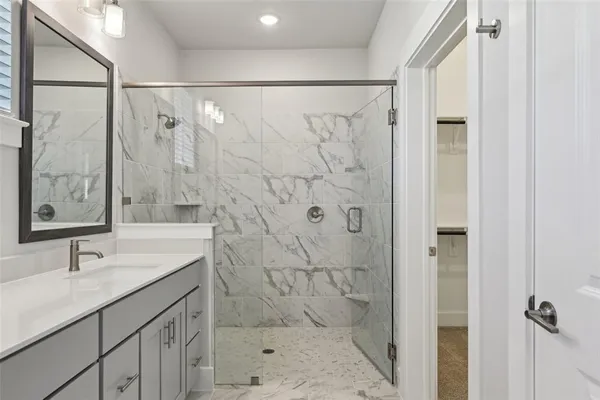 an empty room with view of ceiling fan