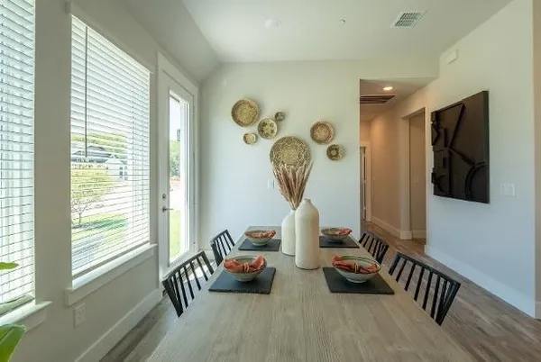 a view of a pathway with a yard