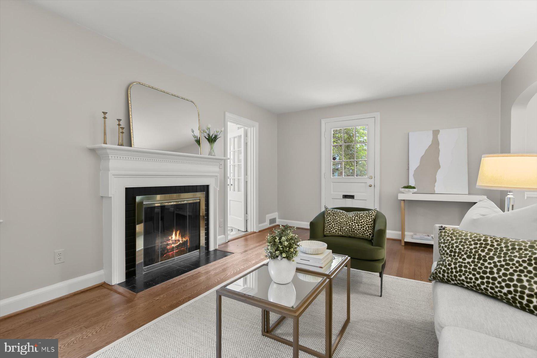 5910 Cobalt Road Bethesda, MD 20816 - Photo 7 of 35 Living room with wood burning fireplace