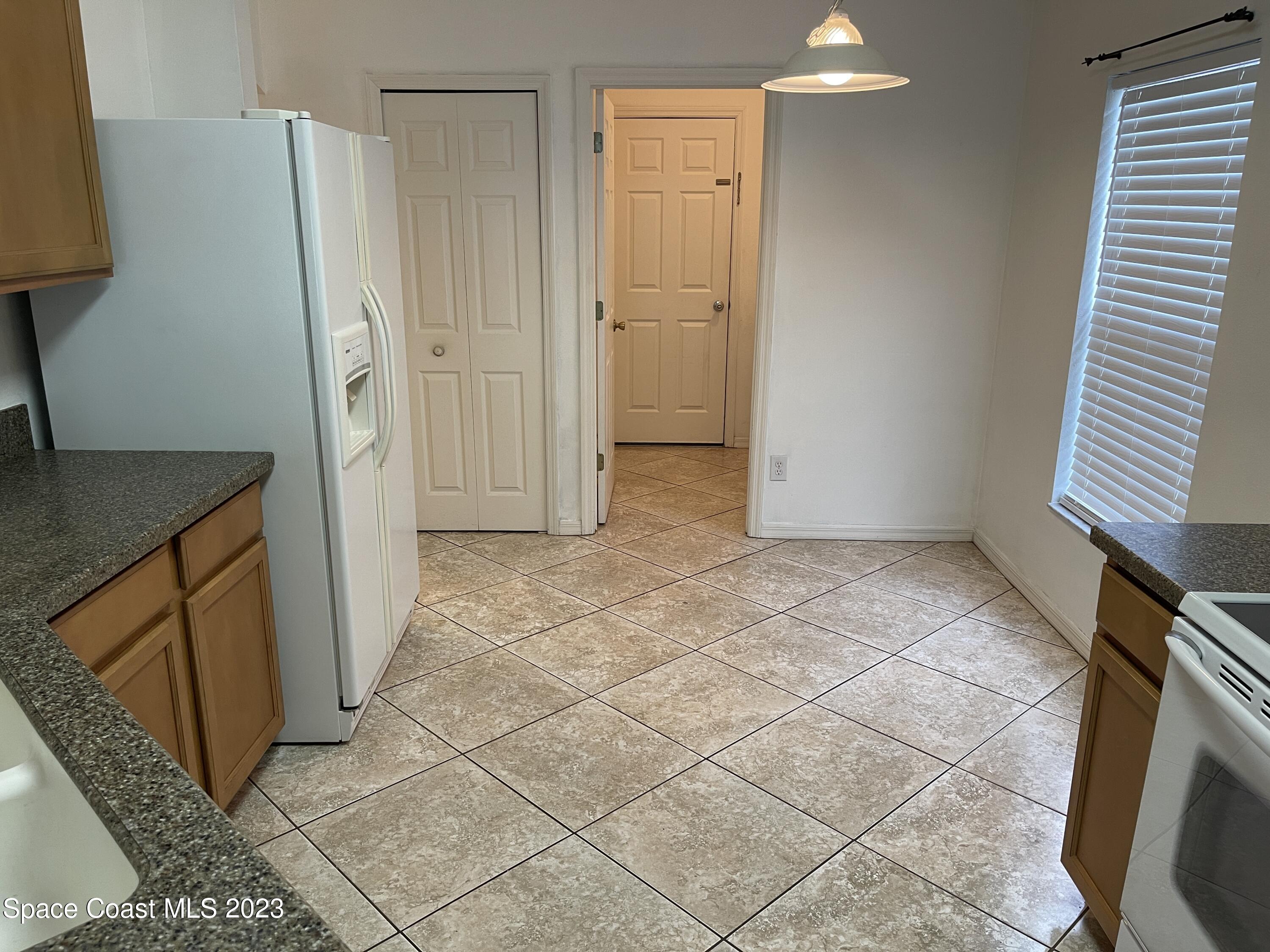 527 Melanie Circle Melbourne, FL 32901 - Photo 8 of 18 a view of a storage & utility room with a sink