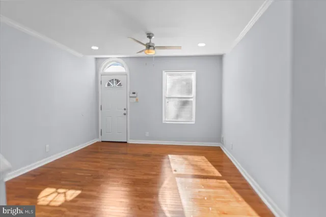 a view of a hallway with front door