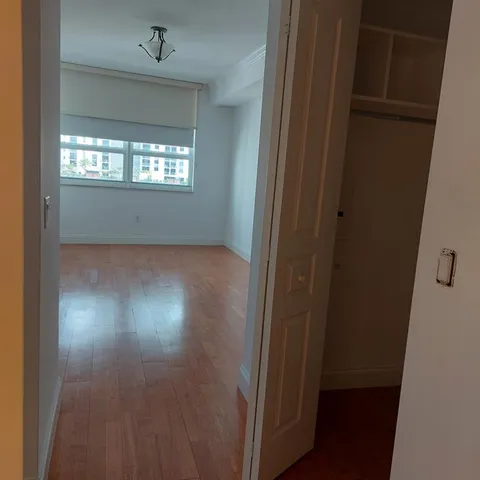 a view of empty room with windows