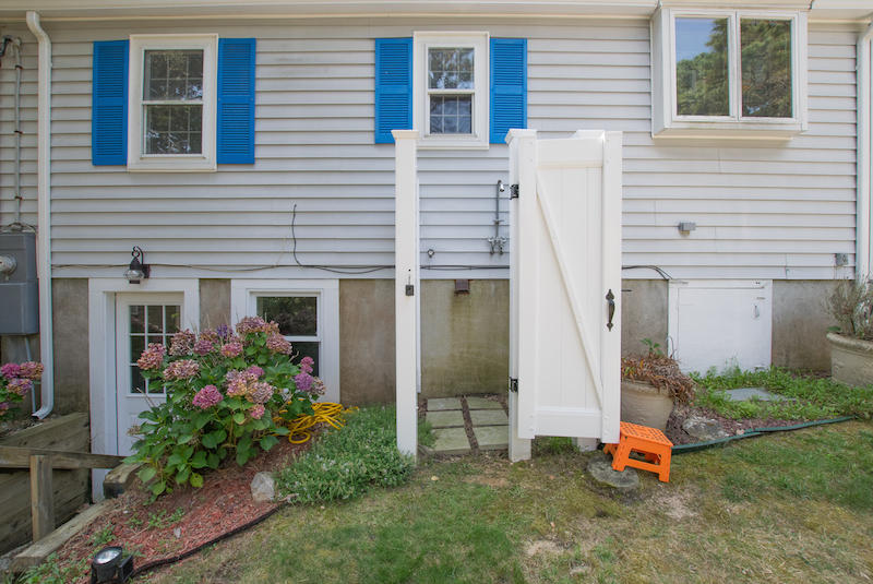 60 Youngs Road Chatham, MA 02633 - Photo 18 of 21 a front view of a house with a yard