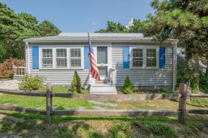 60 Youngs Road Chatham, MA 02633 - Photo 20 of 21 front view of a house with a yard