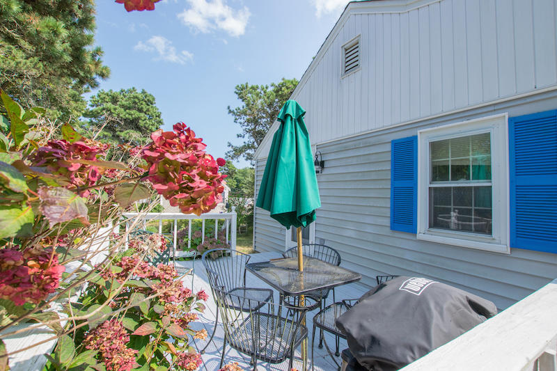 60 Youngs Road Chatham, MA 02633 - Photo 2 of 21 a front view of house with yard and seating space