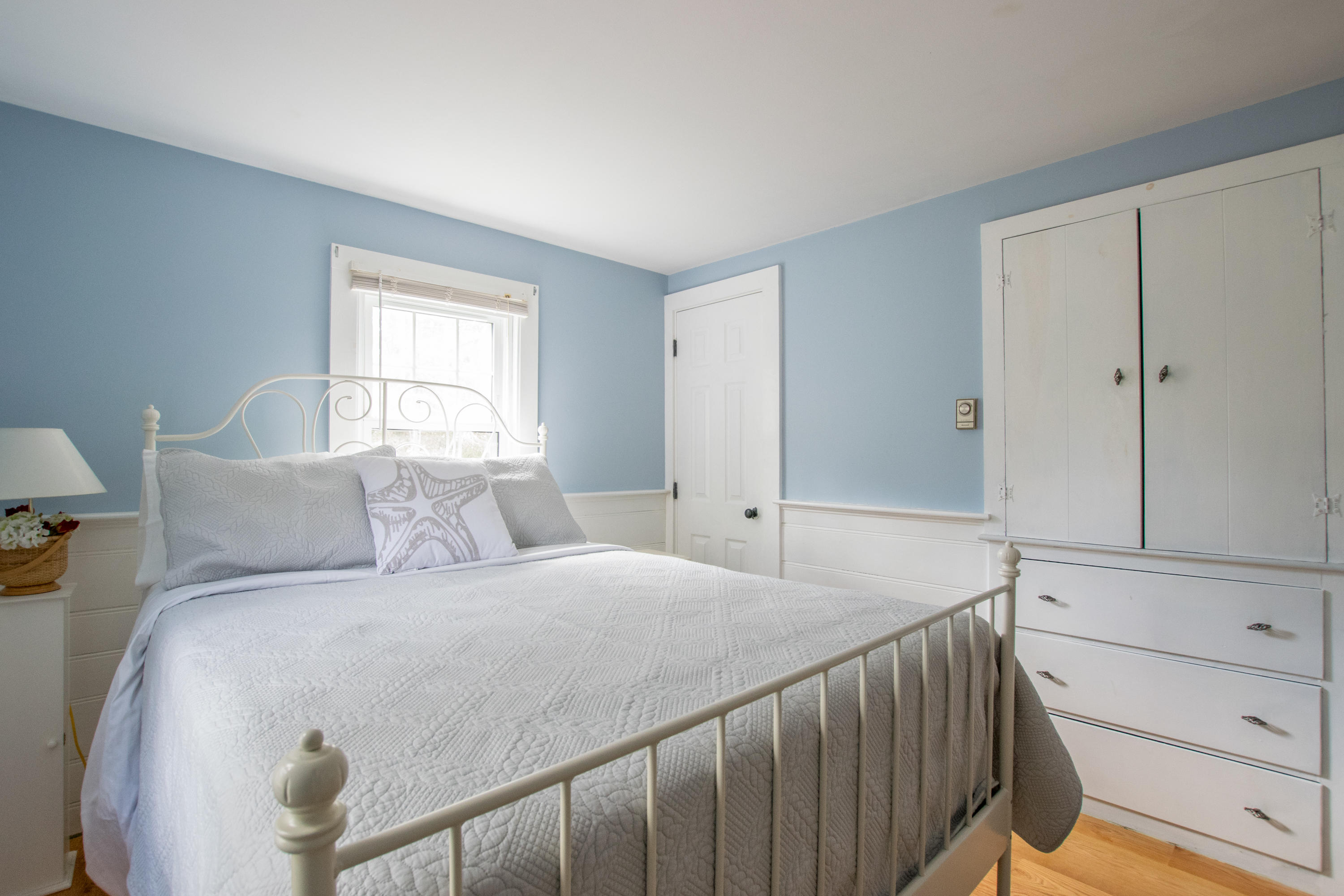 60 Youngs Road Chatham, MA 02633 - Photo 6 of 21 a bedroom with a bed and a window