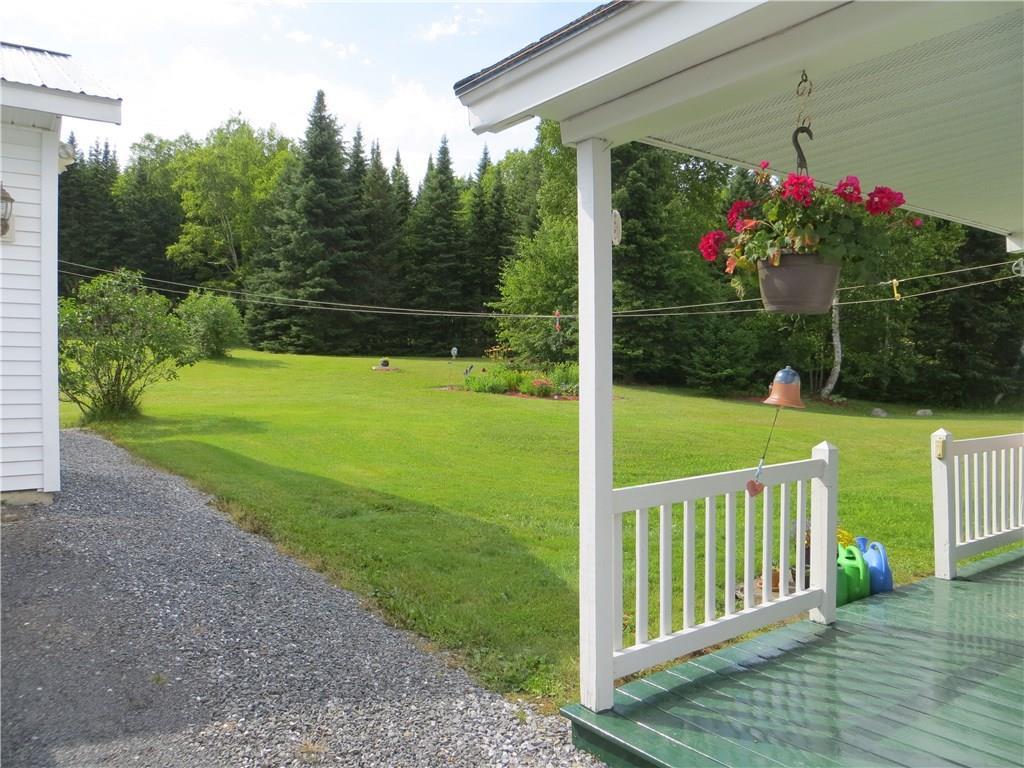 961 Aroostook Road Wallagrass, ME 04781 - Photo 29 of 32 Exterior back covered porch.