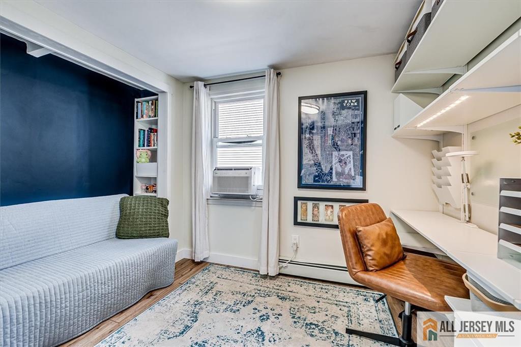 121 East Cliff Road Colonia, NJ 07067 - Photo 20 of 35 a living room with furniture rug and window
