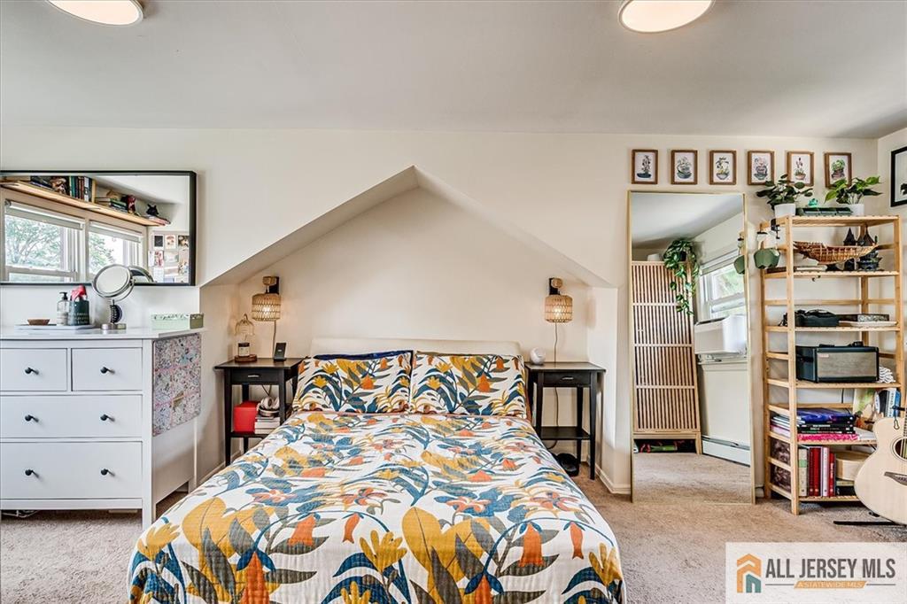 121 East Cliff Road Colonia, NJ 07067 - Photo 22 of 35 a bedroom with bed and a window