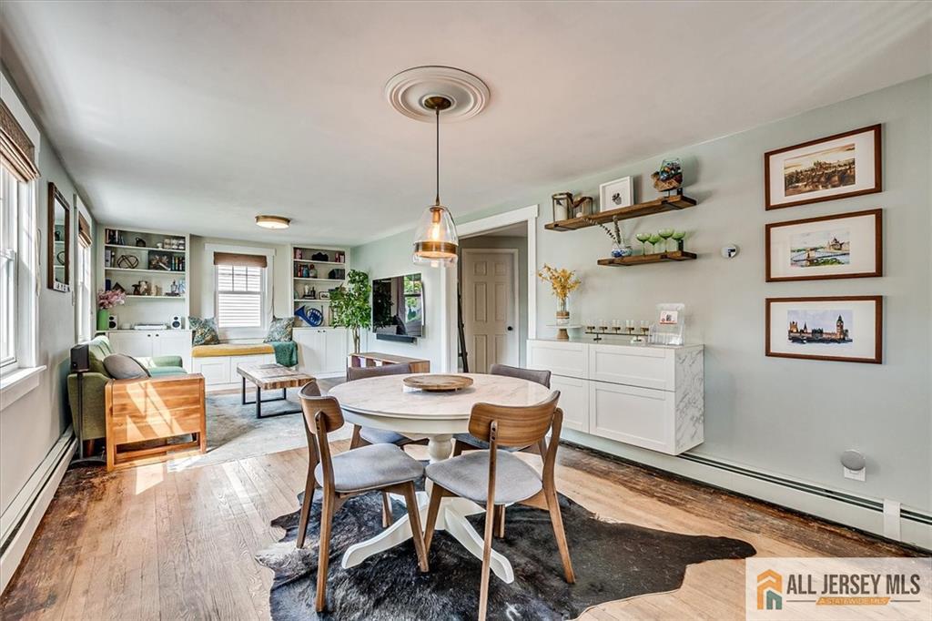 121 East Cliff Road Colonia, NJ 07067 - Photo 5 of 35 a dining room with furniture and window