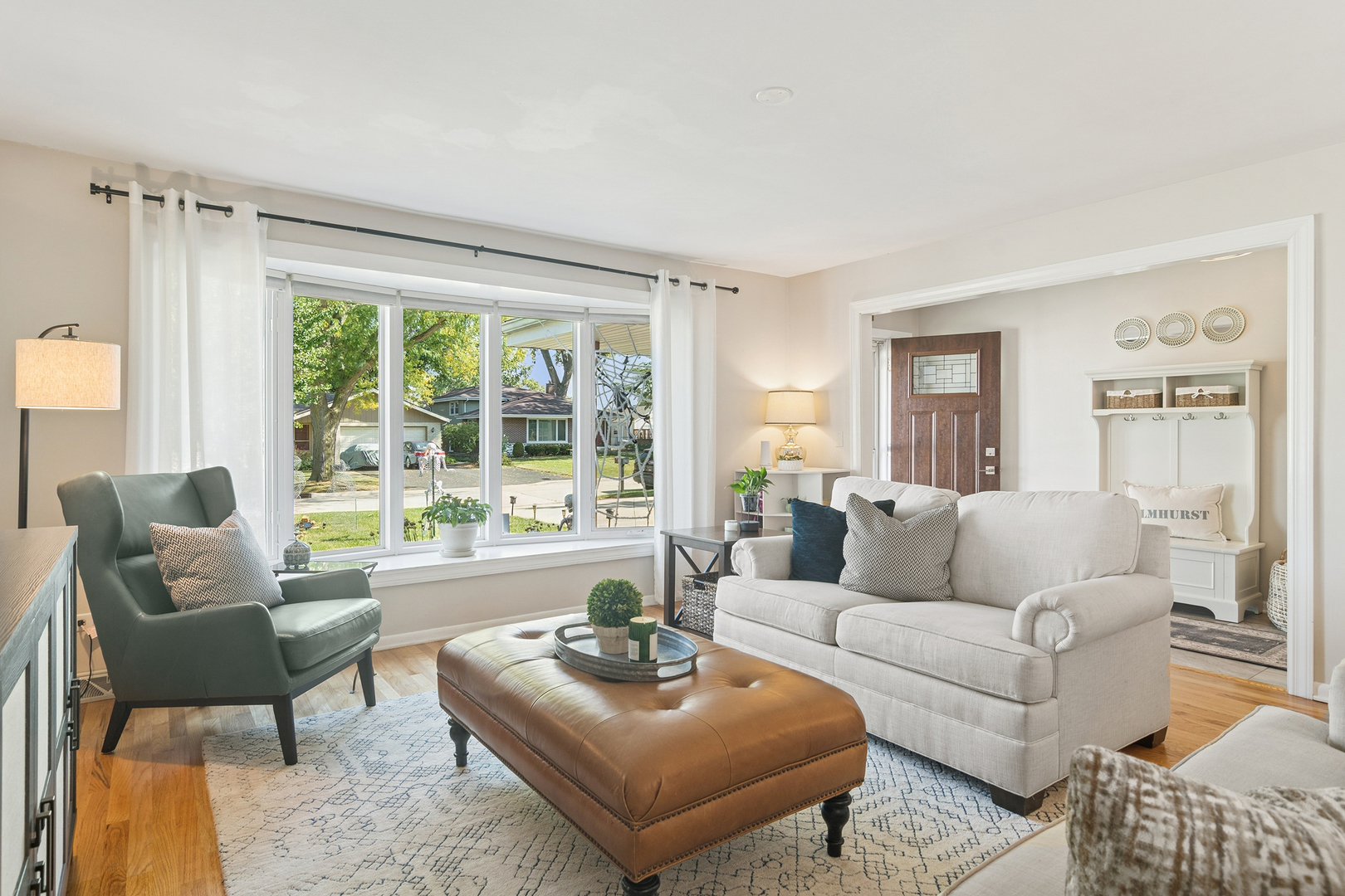 530 North Myrtle Avenue Elmhurst, IL 60126 - Photo 12 of 44 a living room with furniture and a large window