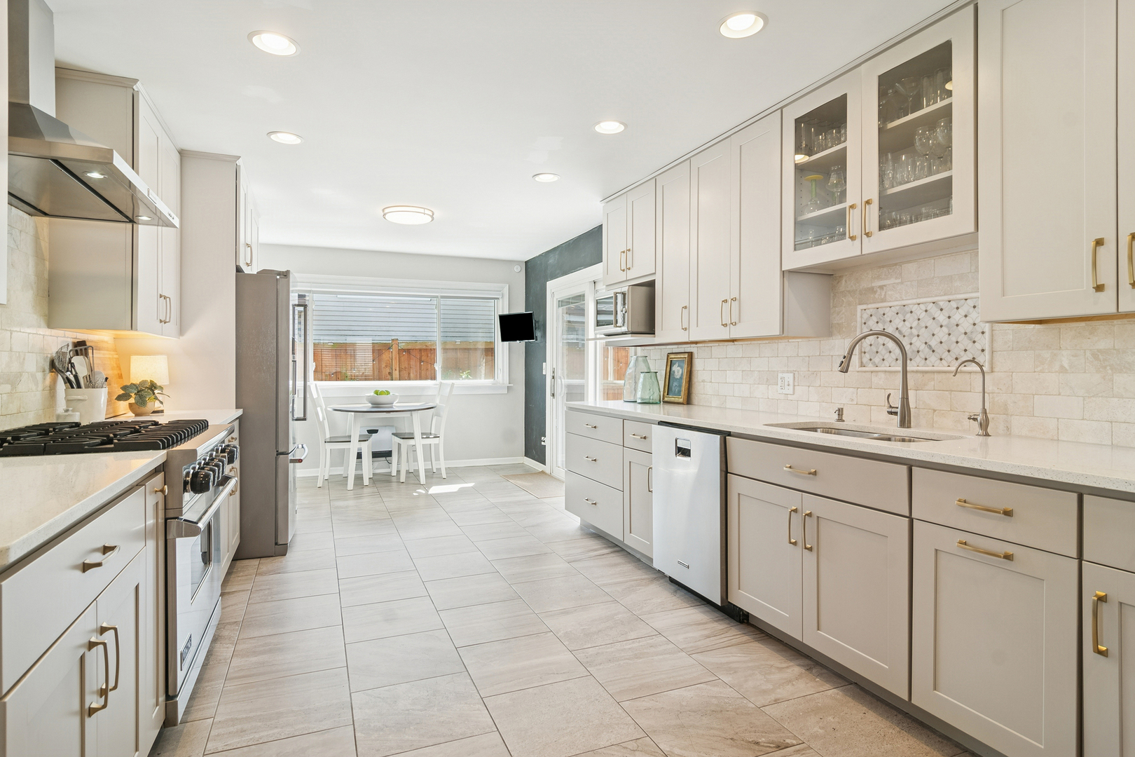 530 North Myrtle Avenue Elmhurst, IL 60126 - Photo 6 of 44 a kitchen with stainless steel appliances granite countertop a sink and cabinets