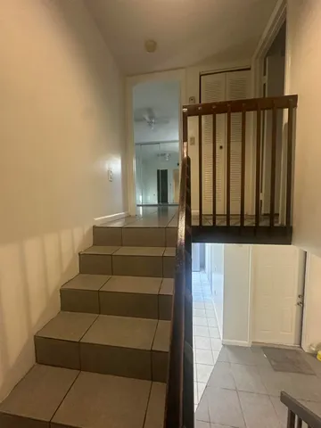 a view of entryway with stairs