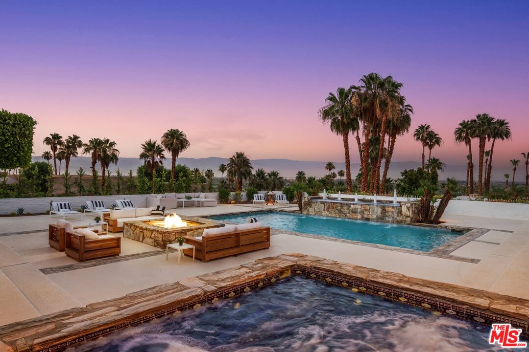 70255 Thunderbird Road Rancho Mirage, CA 92270 - Photo 4 of 53 a view of a lake with sitting space