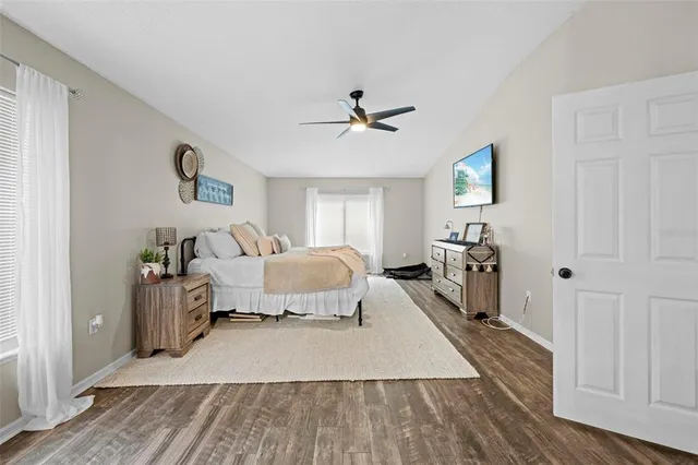 a bathroom with a shower and a sink