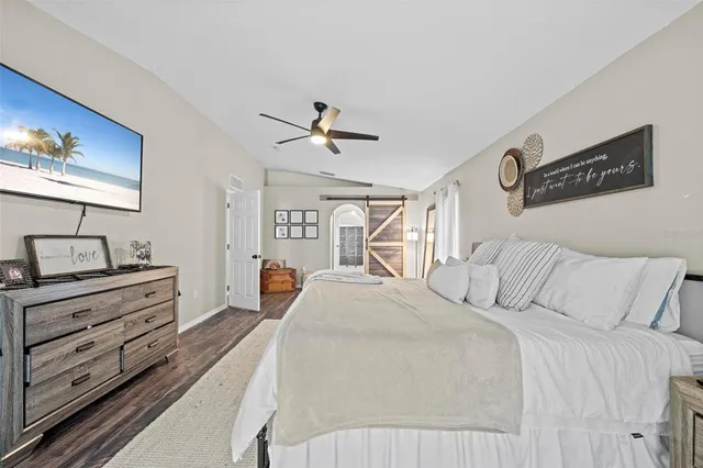 a bathroom with a bathtub a sink and a mirror