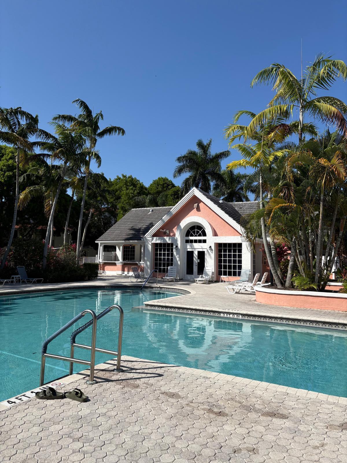 1125 Crystal Way Delray Beach, FL 33444 - Photo 33 of 38 pool and club house
