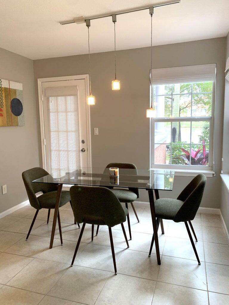 1125 Crystal Way Delray Beach, FL 33444 - Photo 4 of 38 dining and balcony door
