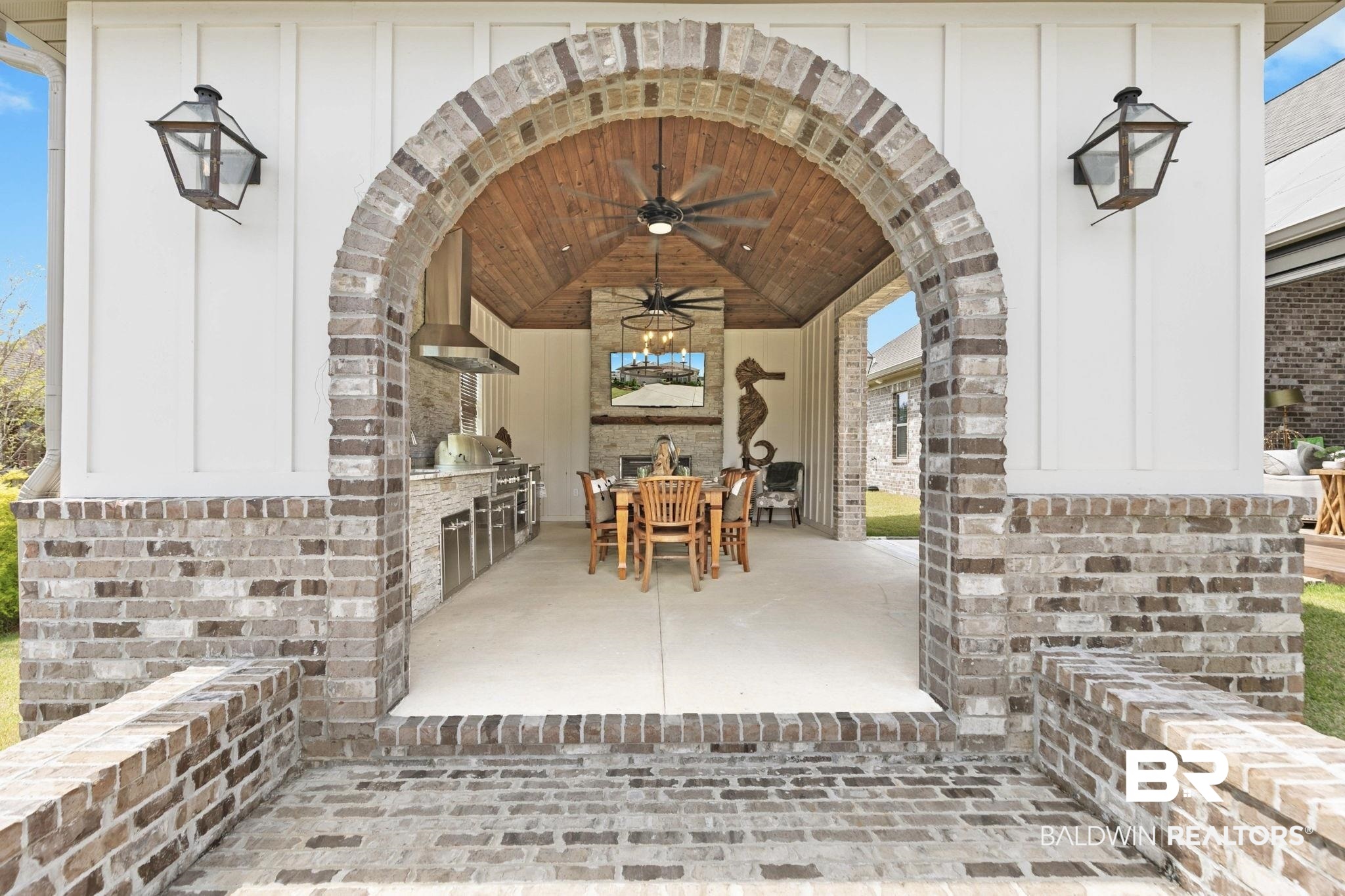 291 Hemlock Drive Fairhope, AL 36532 - Photo 51 of 65 View of patio / terrace featuring an outdoor kitchen / dining area and a ceiling fan