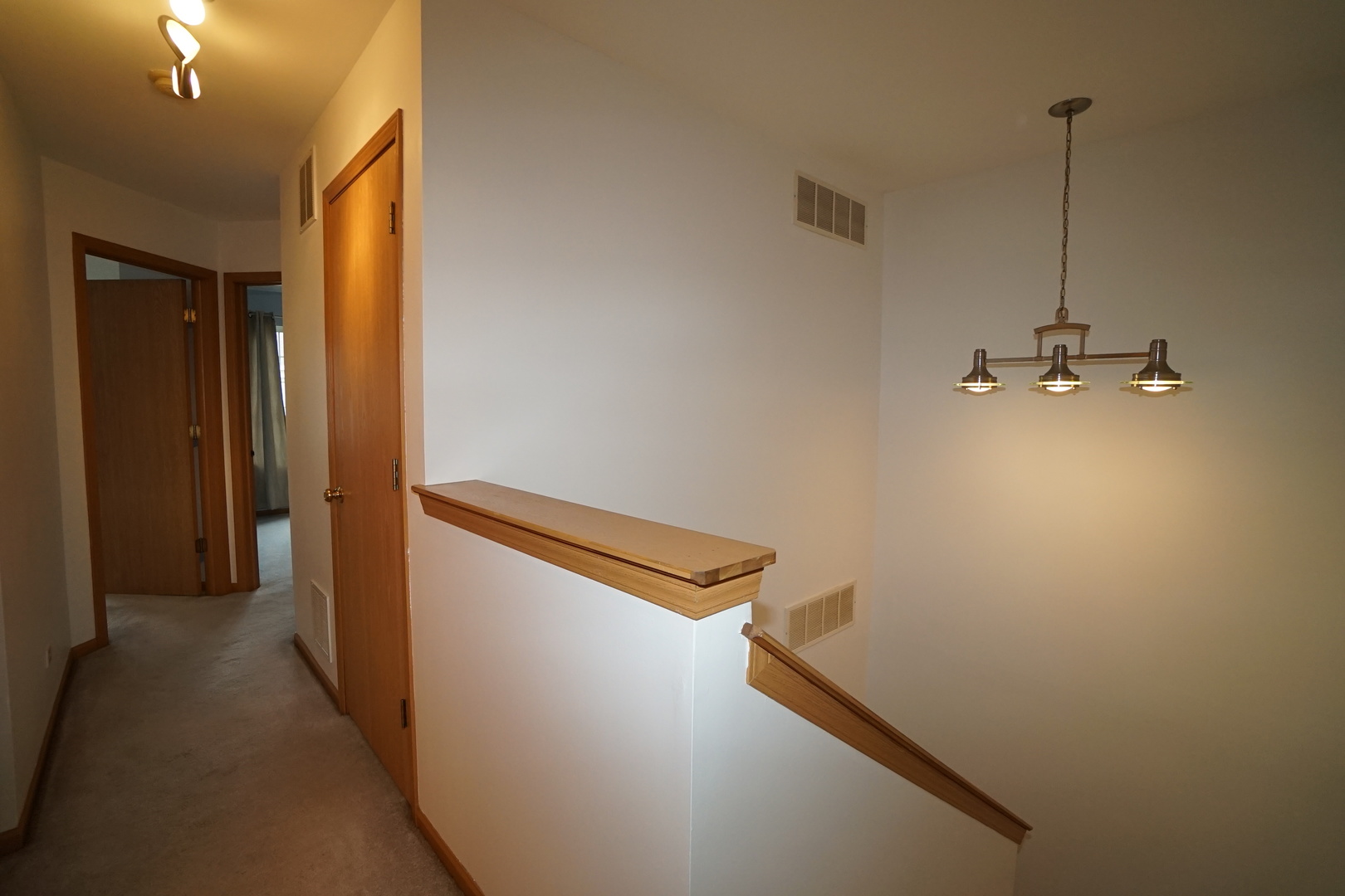 826 County Line Road Aurora, IL 60502 - Photo 15 of 21 a view of a hallway with stairs