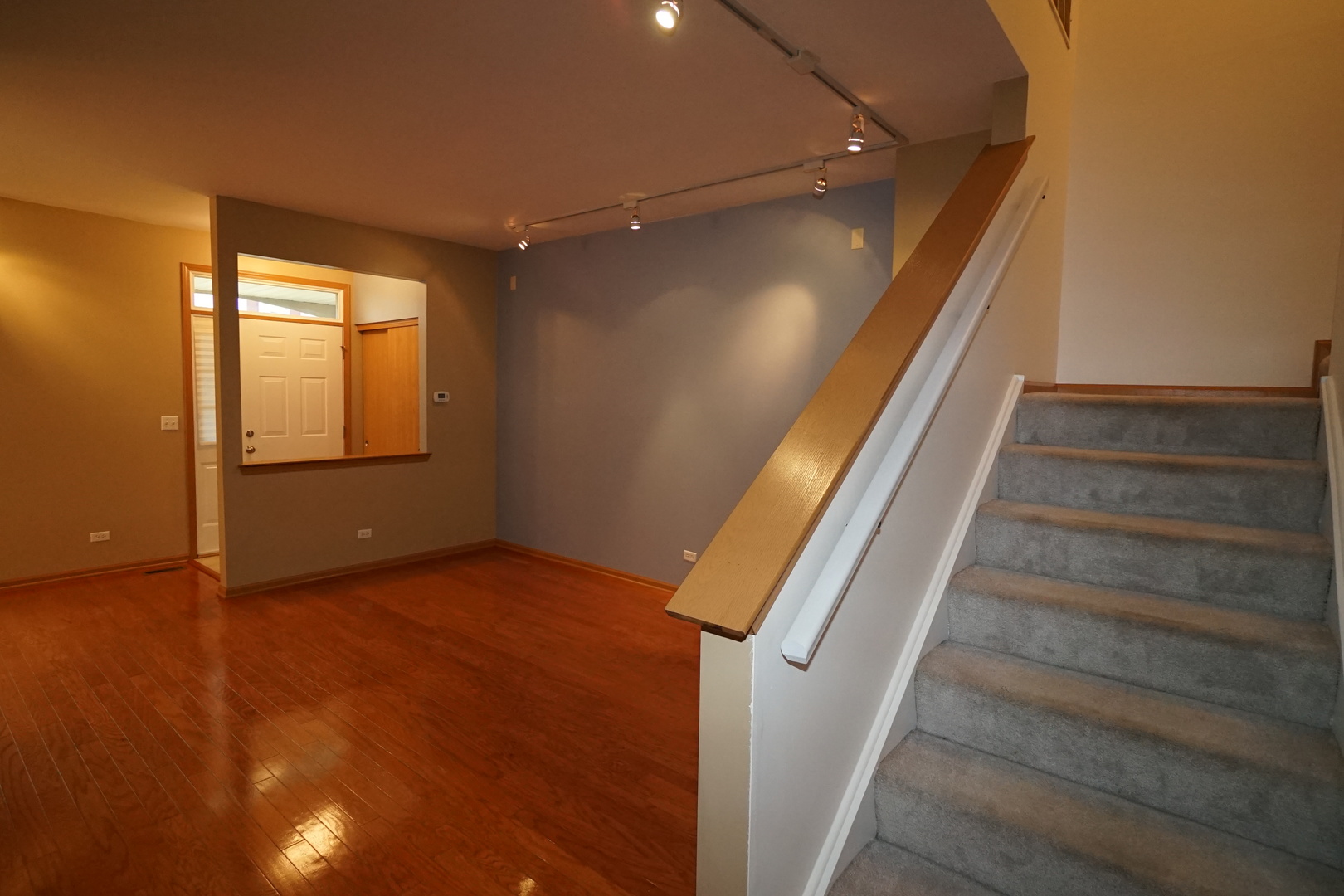 826 County Line Road Aurora, IL 60502 - Photo 7 of 21 a view of an empty room with stairs