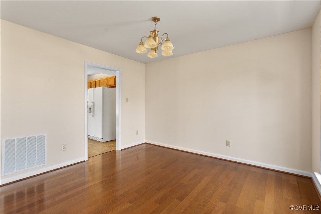 2605 Amherst Ridge Loop Colonial Heights, VA 23834 - Photo 11 of 20 Unfurnished room with a notable chandelier, visibl