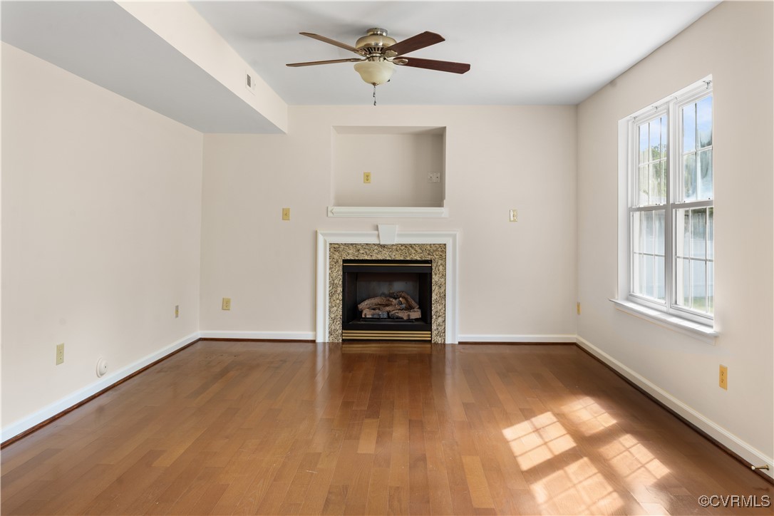 2605 Amherst Ridge Loop Colonial Heights, VA 23834 - Photo 6 of 20 Unfurnished living room featuring baseboards, a ce
