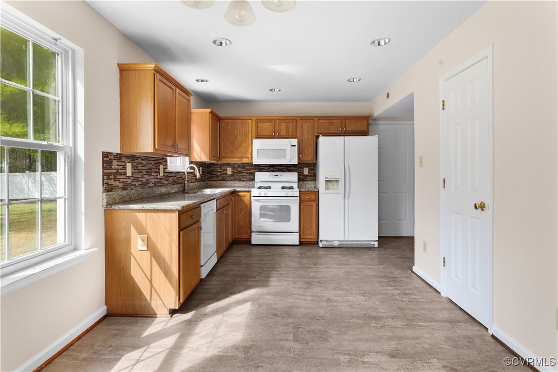 2605 Amherst Ridge Loop Colonial Heights, VA 23834 - Photo 7 of 20 Kitchen featuring tasteful backsplash, baseboards,