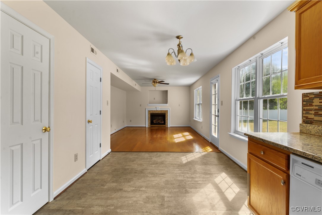 2605 Amherst Ridge Loop Colonial Heights, VA 23834 - Photo 10 of 20 Unfurnished living room featuring baseboards, a fi