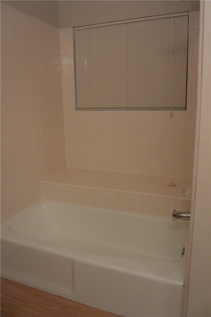 4902 Smokey Valley, Unit A Austin, TX 78731 - Photo 12 of 19 Large master tub with sitting area.