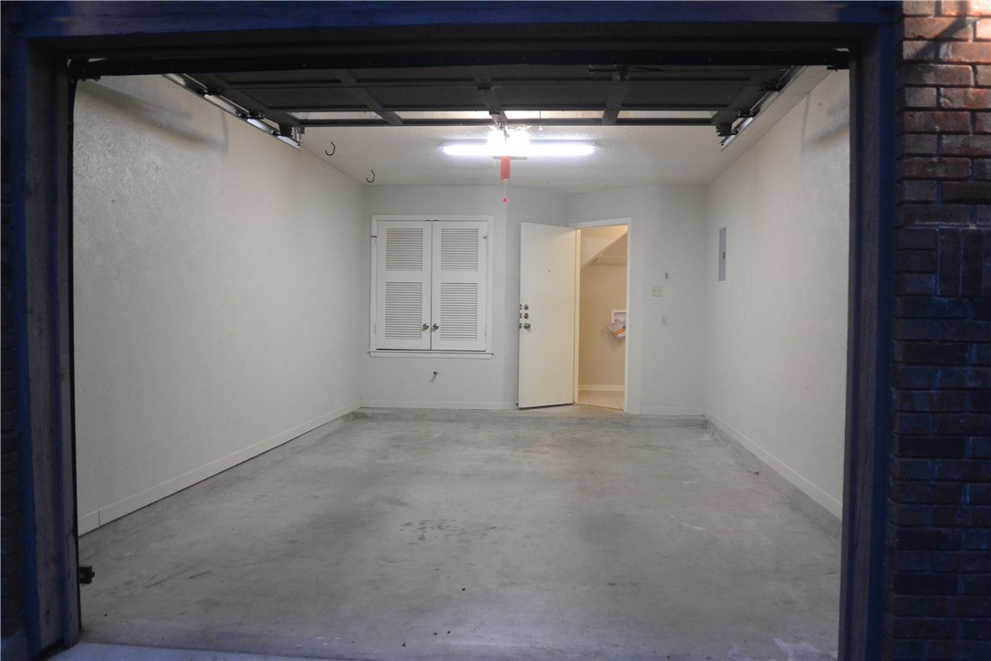 4902 Smokey Valley, Unit A Austin, TX 78731 - Photo 19 of 19 One car garage with garage door opener.